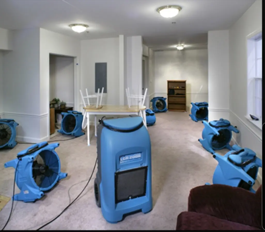 Air movers and dehumidifier setup for Water Damage Restoration in Fairburn